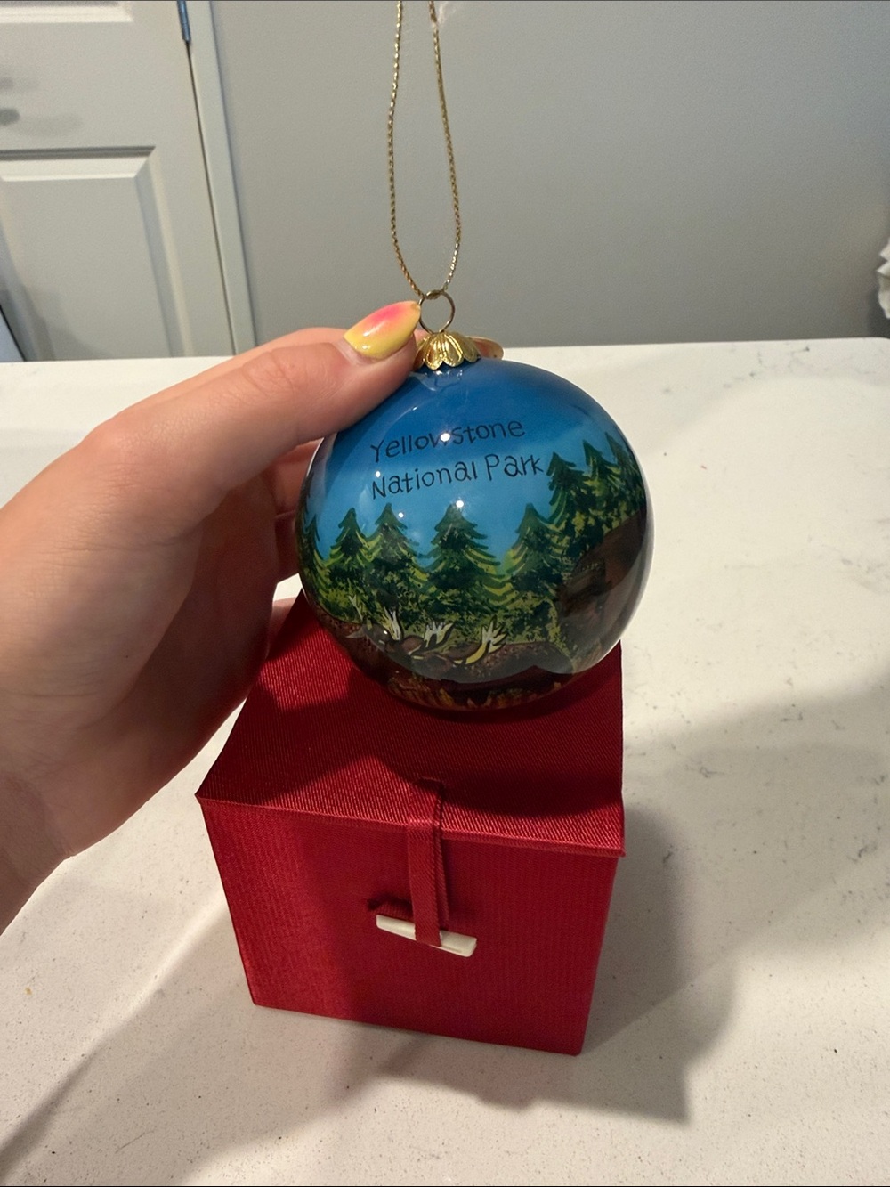 Yellowstone National Park Hand-Painted Blue Glass Ornament
